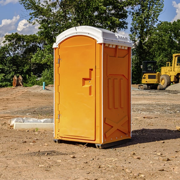 how often are the portable restrooms cleaned and serviced during a rental period in Tribune